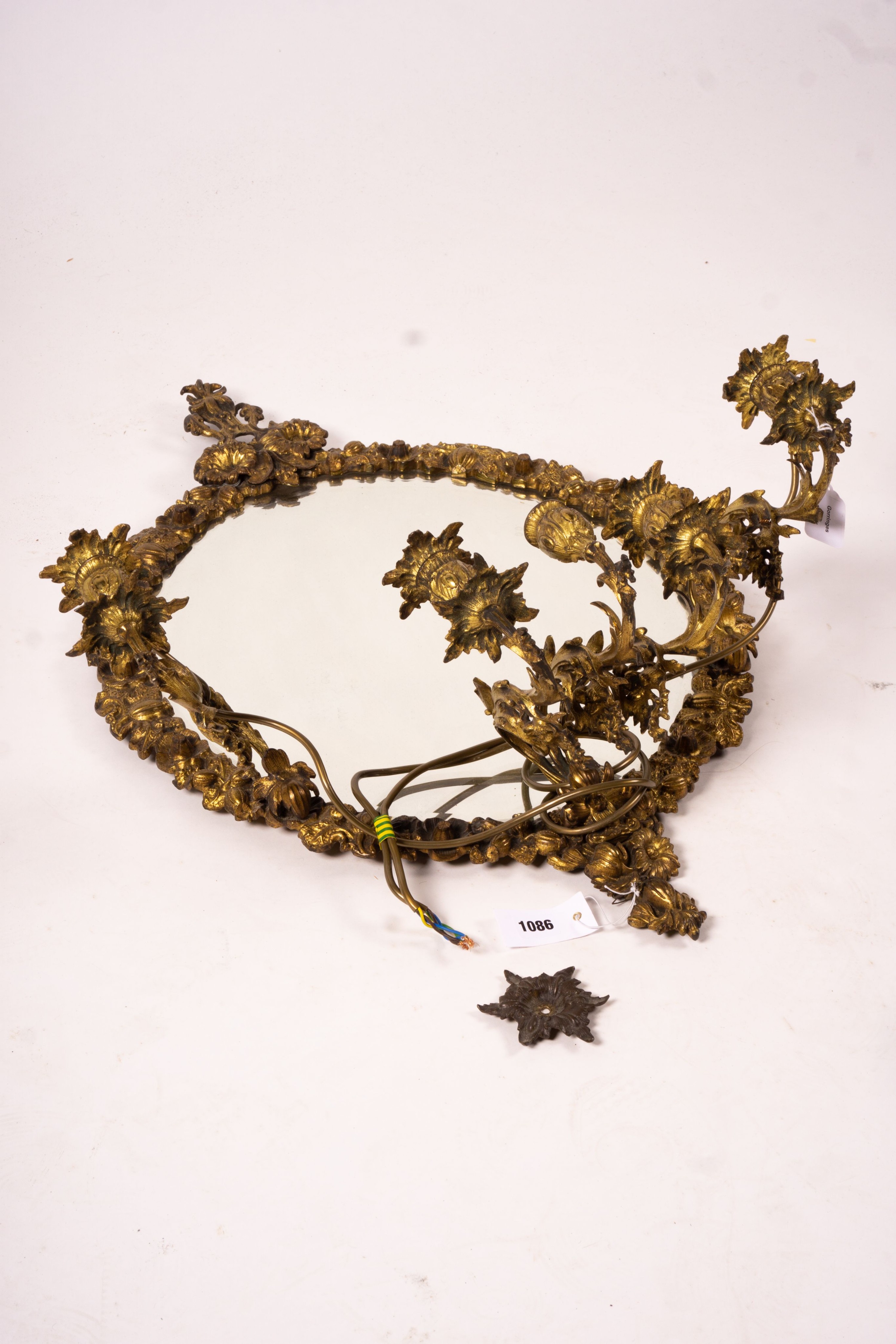 A late 19th century brass five branch girondole, width 64cm, height 84cm